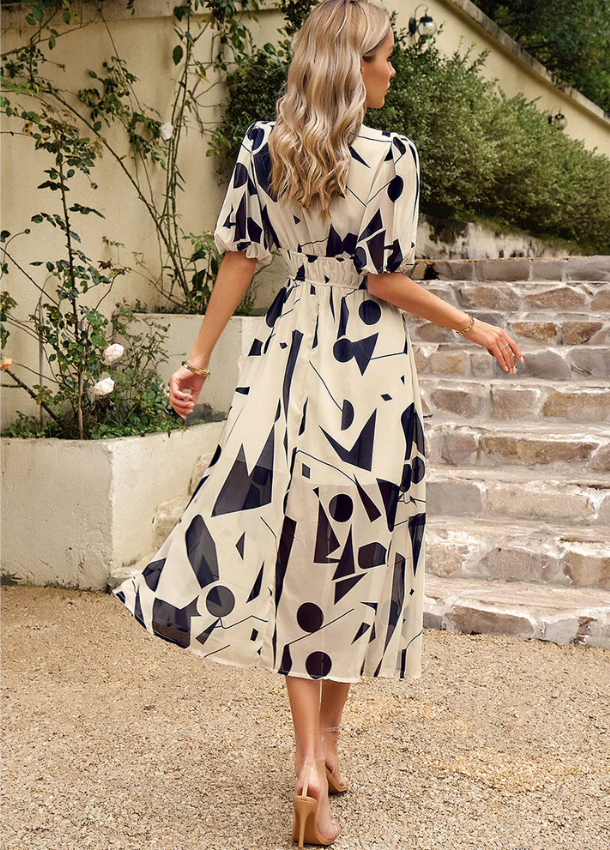 Elina - Vestito Midi Floreale Che Slancia