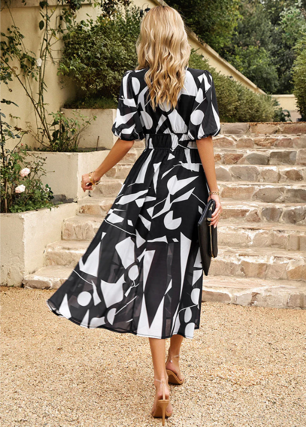 Elina - Vestito Midi Floreale Che Slancia