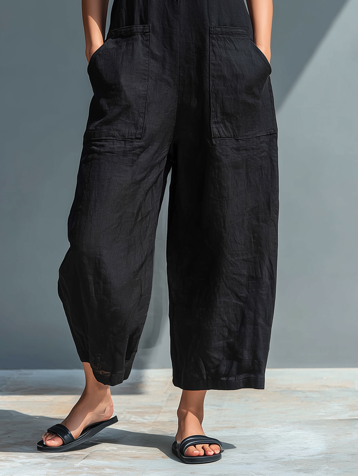 Claudia | Mono minimalista in lino per donna, senza maniche, colletto alto e bottoni
